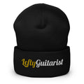Black cuffed beanie with "LeftyGuitarist" embroidered in gold and white on the front.