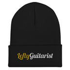 Black cuffed beanie featuring the embroidered text "LeftyGuitarist" in gold and silver.