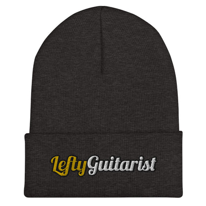 Dark grey cuffed beanie featuring the embroidered text "LeftyGuitarist" in gold and silver colors.
