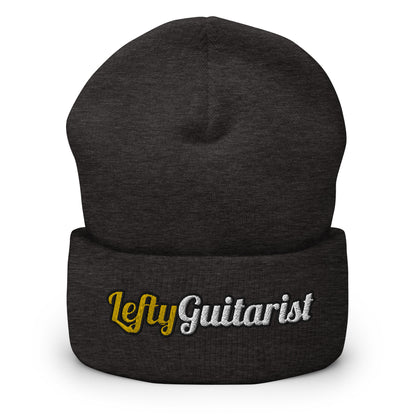 Cuffed dark grey beanie featuring "LeftyGuitarist" embroidered in gold and white on the front.
