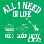 Green T-shirt design featuring white text "All I need in life" with icons for food, sleep, and a left-handed guitar.