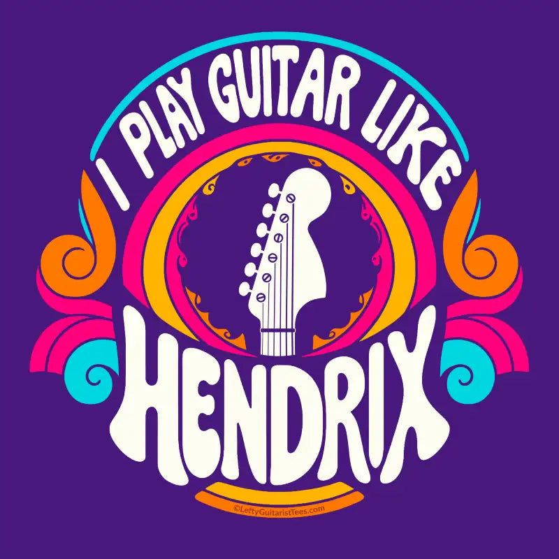 Psychedelic unisex tee featuring "I Play Guitar Like HENDRIX" text and a lefty guitar headstock silhouette on a purple background.