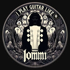 Black T-shirt design featuring "I Play Guitar Like Iommi" text and intricate graphic design with a guitar headstock and gothic elements