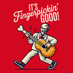 It's Fingerpickin' Good!" unisex guitar T-shirt design featuring a cartoon character playing a guitar on a red background.