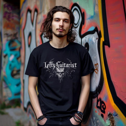 Black unisex T-shirt featuring the "LeftyGuitarist" text with a skull design, worn by a model against a colorful graffiti background