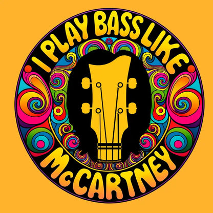 Image preview of "I Play Bass Like McCartney" unisex tee featuring a colorful psychedelic design with a guitar headstock silhouette.