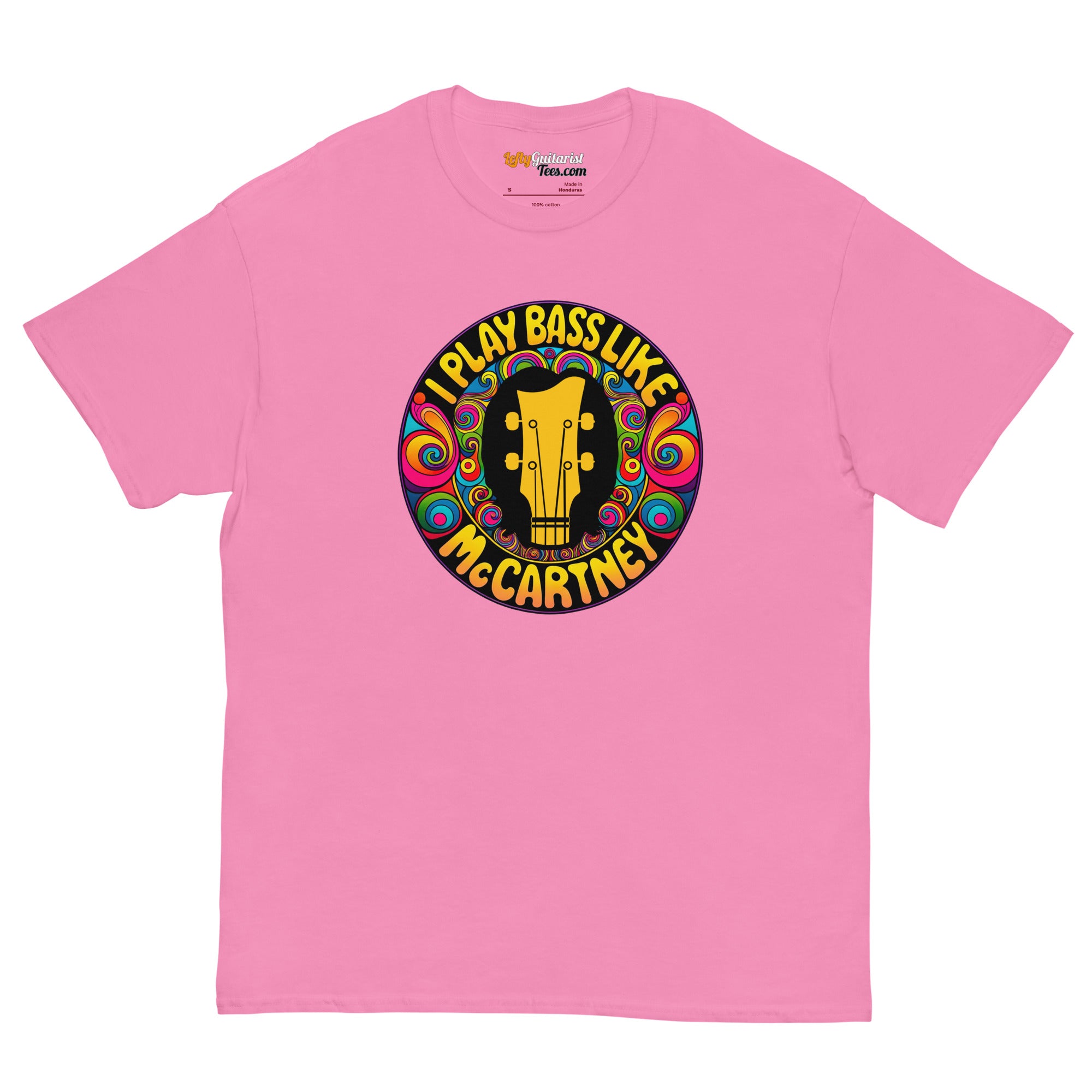 Pink unisex t-shirt featuring a circular graphic with the text "I play bass like McCartney" and a guitar illustration.