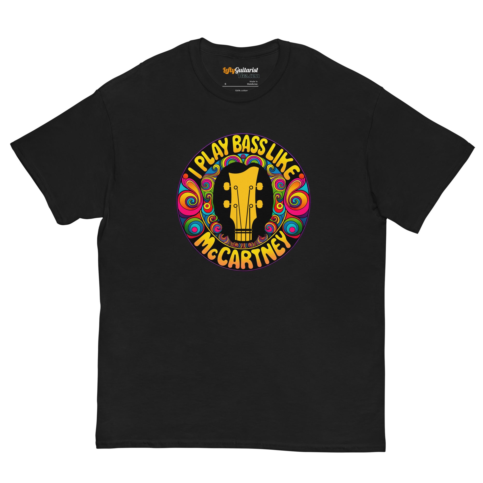 Black unisex t-shirt featuring a colorful circular design with the text "I play bass like McCartney" and a guitar silhouette.