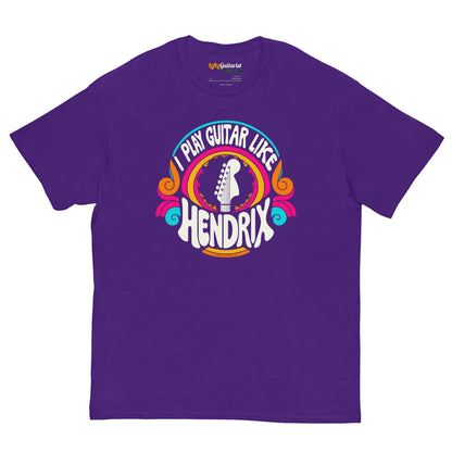 Purple unisex t-shirt featuring the text "I play guitar like HENDRIX" with a guitar headstock graphic and colorful psychedelic design.