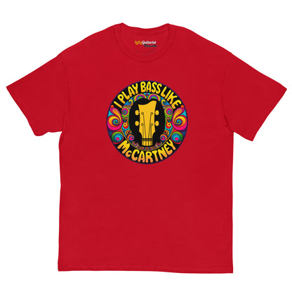 Red unisex t-shirt featuring a circular graphic with "I Play Bass Like McCartney" and a guitar design in vibrant colors.