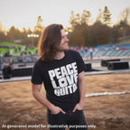 English man with long brown hair wearing a black unisex T-shirt featuring a large block of white text that reads "PEACE LOVE LEFTY GUITAR".