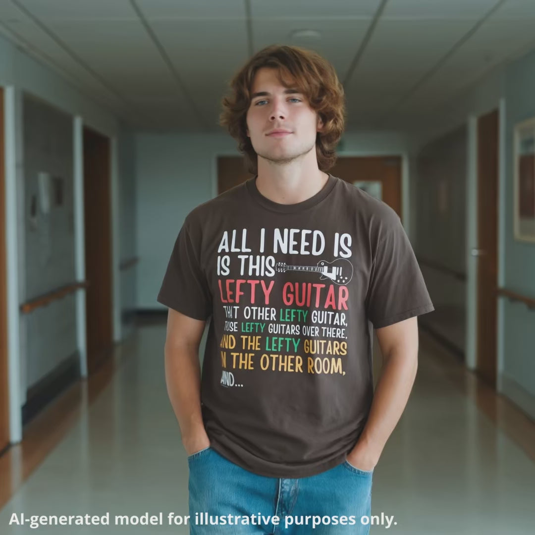 Dark chocolate unisex t-shirt featuring colorful text that reads "All I need is this lefty guitar" with a lefty guitar graphic.