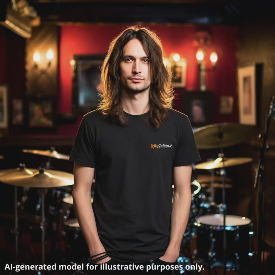 Woman wearing a LeftyGuitarist small logo unisex t-shirt in black, featuring a subtle logo on the left chest area.