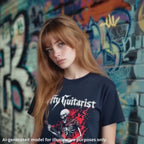 Flaming red skeleton graphic on a navy unisex T-shirt, worn by a redheaded woman against a graffiti-covered wall.