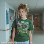 Forest green unisex t-shirt featuring colorful text that reads "All I need is this lefty guitar" with a lefty guitar graphic.