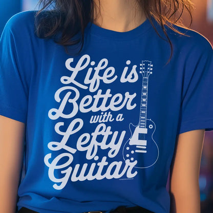 Blue unisex T-shirt featuring the phrase "Life is Better with a Lefty Guitar" and an illustration of a left handed guitar.