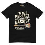 Black unisex t-shirt featuring the text "I'm not perfect but I am a lefty bassist" and a lefty bass guitar graphic.