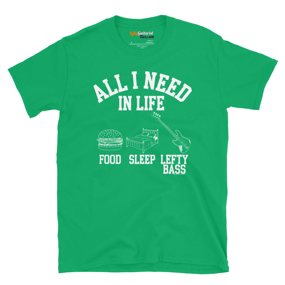 Green unisex T-shirt featuring the white text "All I Need in Life - Food, Sleep, Lefty Bass" with icons of a burger, bed, and a left handed bass guitar