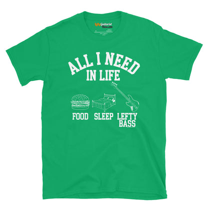 Green unisex T-shirt featuring the white text "All I Need in Life - Food, Sleep, Lefty Bass" with icons of a burger, bed, and a left handed bass guitar
