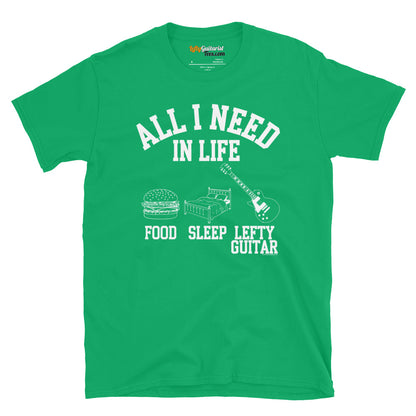 Green unisex T-shirt featuring the text "All I need in life - food, sleep, lefty guitar" with icons of a burger, bed and left handed guitar.