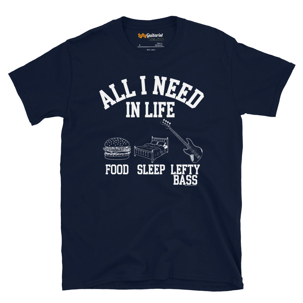 Navy unisex t-shirt featuring the white text "All I Need in Life - Food, Sleep, Lefty Bass" with graphics of a burger, bed and a left handed bass guitar