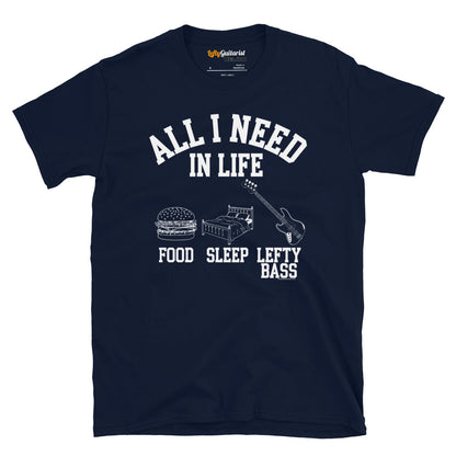 Navy unisex t-shirt featuring the white text "All I Need in Life - Food, Sleep, Lefty Bass" with graphics of a burger, bed and a left handed bass guitar