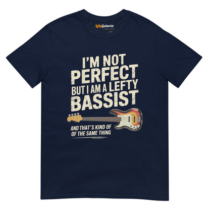 Navy unisex t-shirt featuring the text "I'm not perfect but I am a lefty bassist" and a left handed bass guitar graphic.