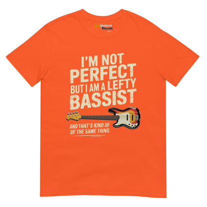 I'm Not Perfect But I Am A Lefty Bassist" unisex t-shirt in bright orange with white text and lefty bass guitar graphic.