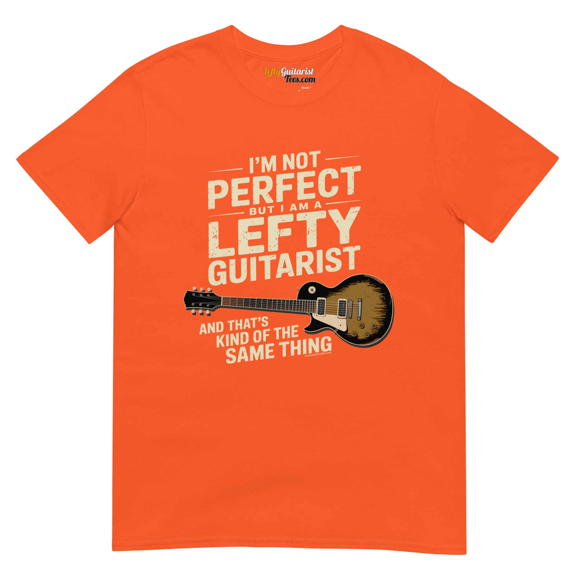 I'm Not Perfect But I Am A Lefty Guitarist" unisex orange T-shirt featuring a lefty guitar graphic and bold white text.