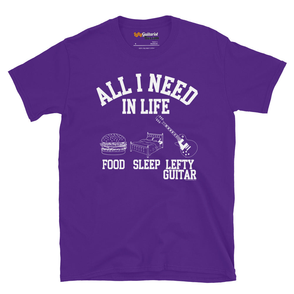 Purple unisex T-shirt featuring the text "All I Need in Life - Food, Sleep, Lefty Guitar" with icons of a burger, bed and left handed guitar.