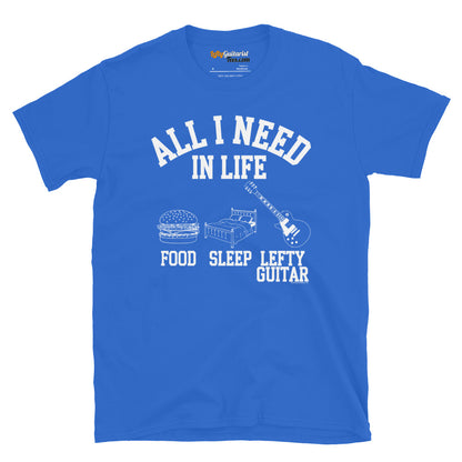 Royal blue unisex T-shirt featuring the text "All I Need in Life - Food, Sleep, Lefty Guitar" with icons of a burger, bed and left handed guitar.