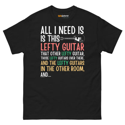 Black unisex t-shirt featuring colorful text that reads "All I need is this lefty guitar" with a lefty guitar graphic.