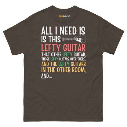 Dark chocolate unisex t-shirt featuring colorful text that reads "All I need is this lefty guitar" with a lefty guitar graphic.