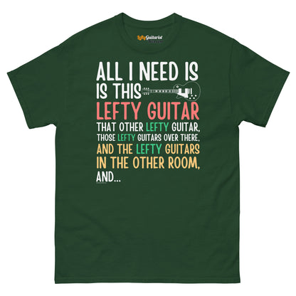 Forest green unisex t-shirt featuring the text "All I need is this lefty guitar" in colorful typography.
