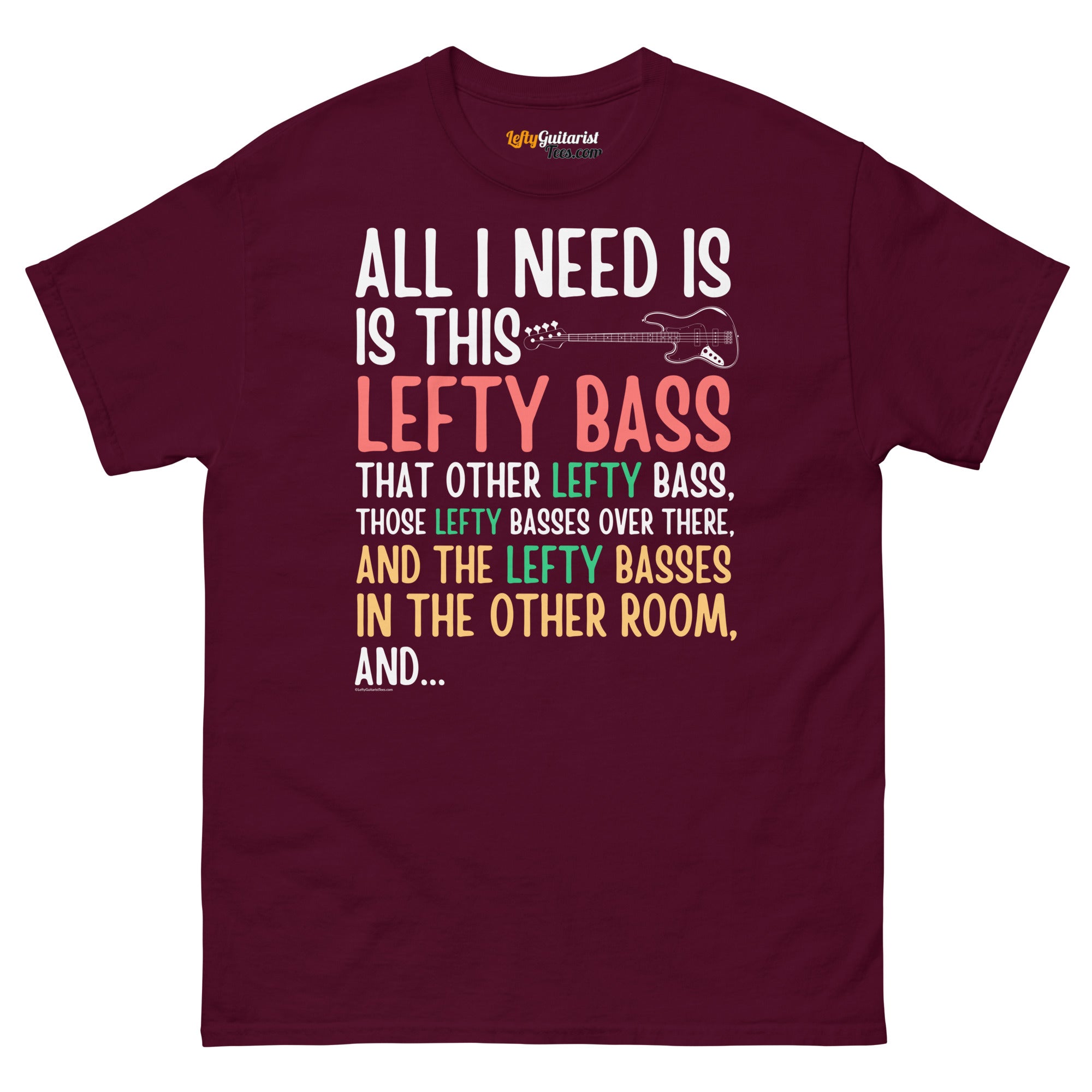 Maroon unisex t-shirt featuring colorful text that reads "All I need is this lefty bass" with playful graphics.