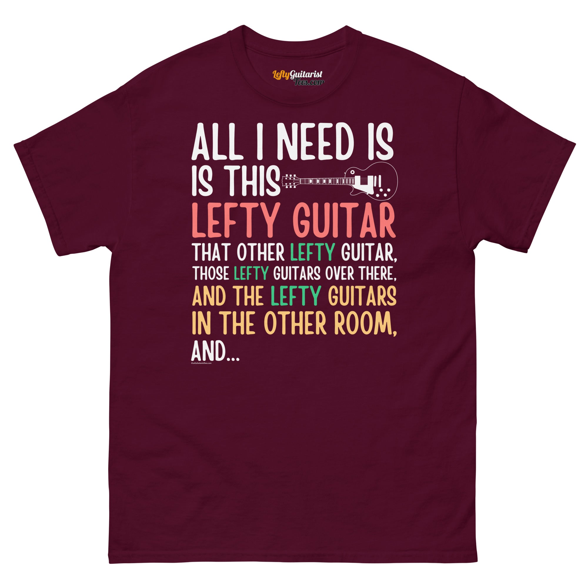 Maroon unisex t-shirt featuring colorful text that reads "All I need is this lefty guitar" with lefty guitar graphic.
