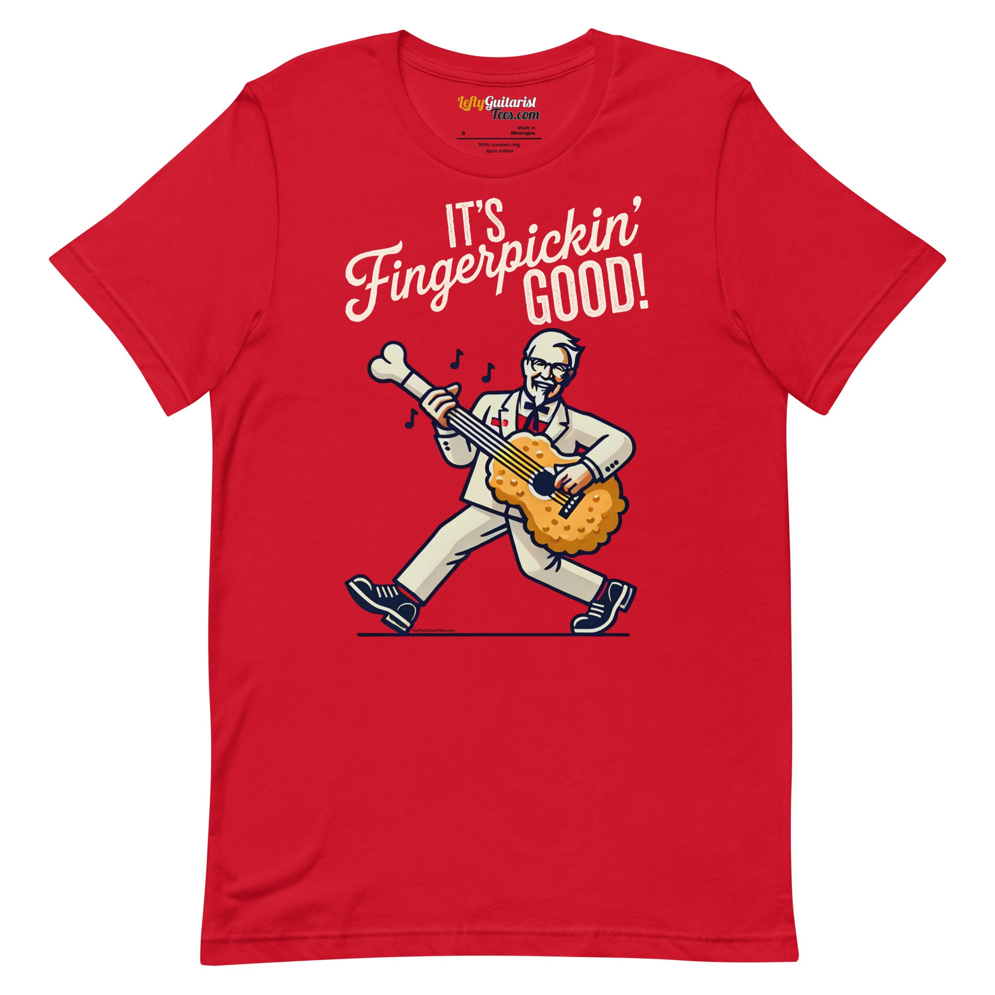 Red unisex T-shirt featuring a cartoon character playing a guitar made of fried chicken with the text "It's Fingerpickin' ...